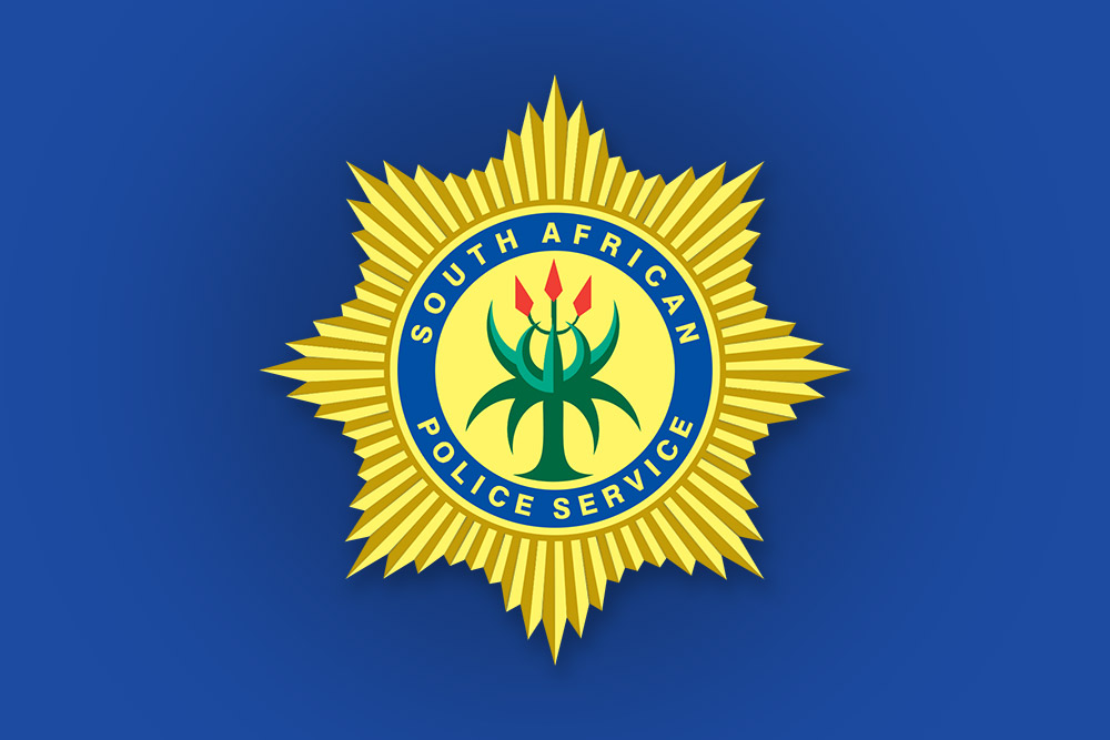 SAPS officers display 95kg of cocaine seized at OR Tambo International Airport in a R28 million drug bust.